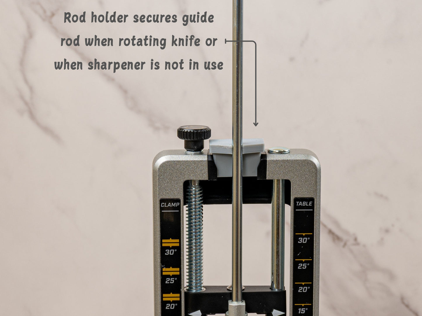 Guide rod holder secures sharpening rod for easier knife rotation and storage.