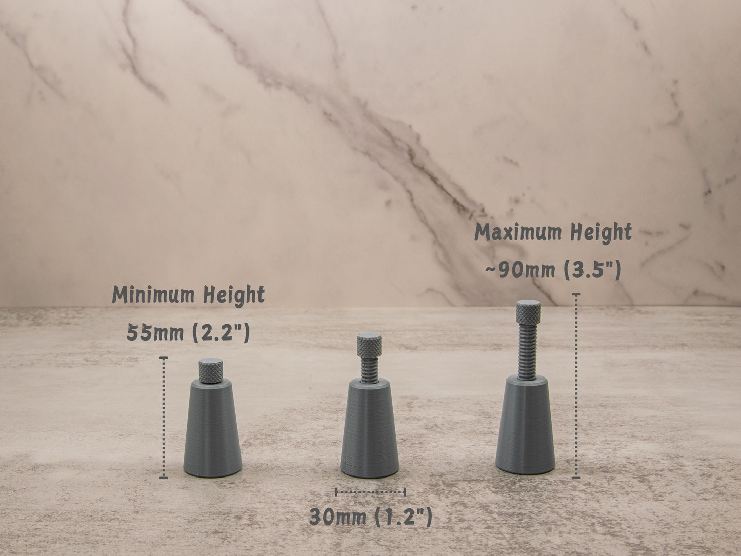 Three adjustable knife edge supports in varying heights (55mm to 90mm) with a 30mm wide base, shown on a marble background.