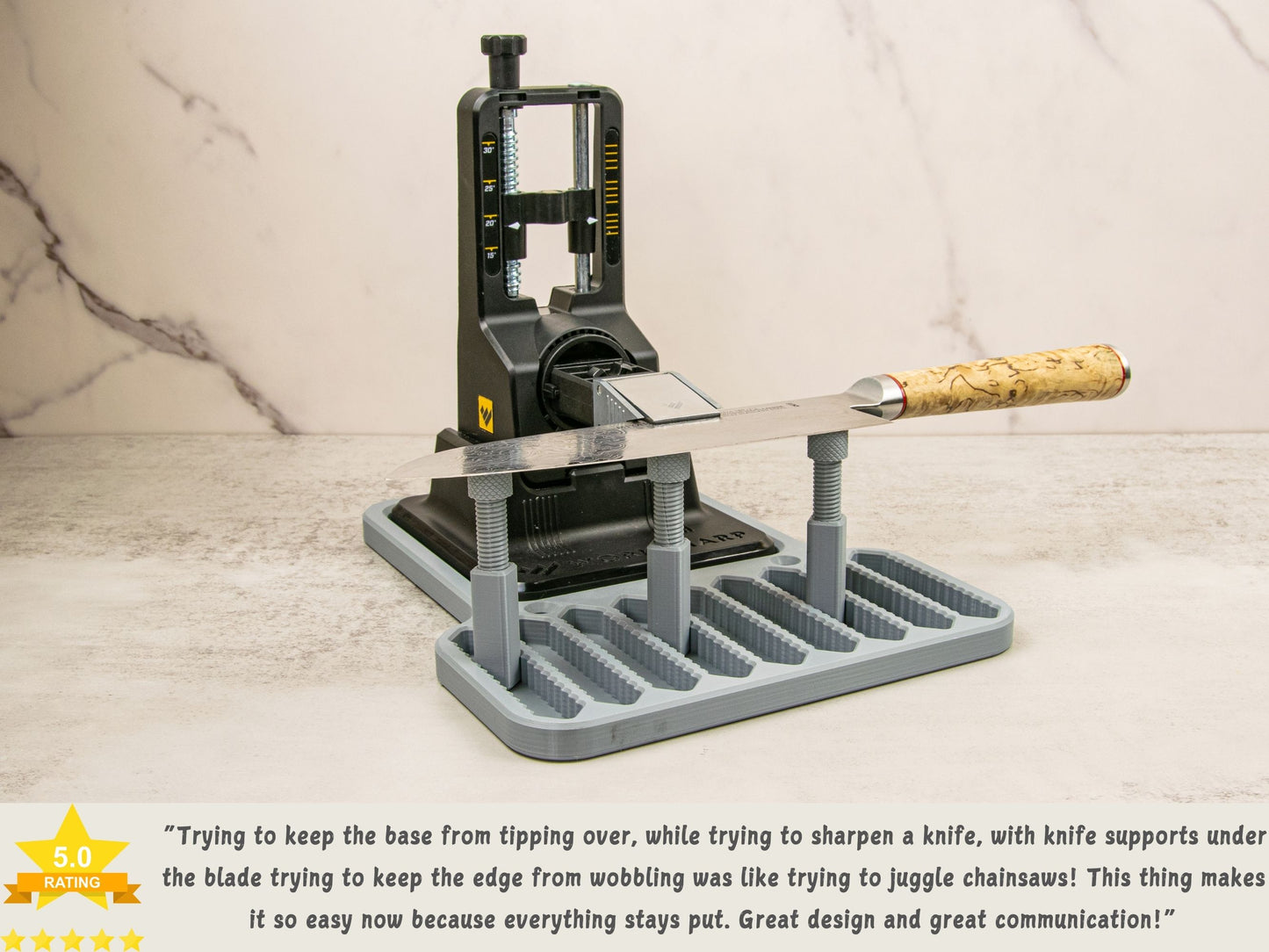 Knife sharpening platform setup with customer review praising stability and usability.