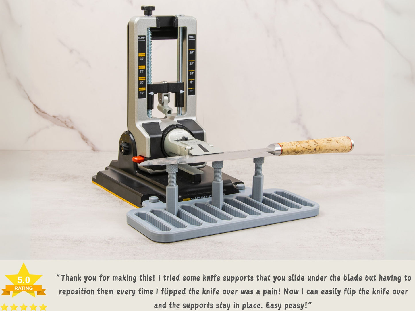 Work Sharp platform in use with three knife supports under a fixed blade; includes a 5-star customer review praising usability.