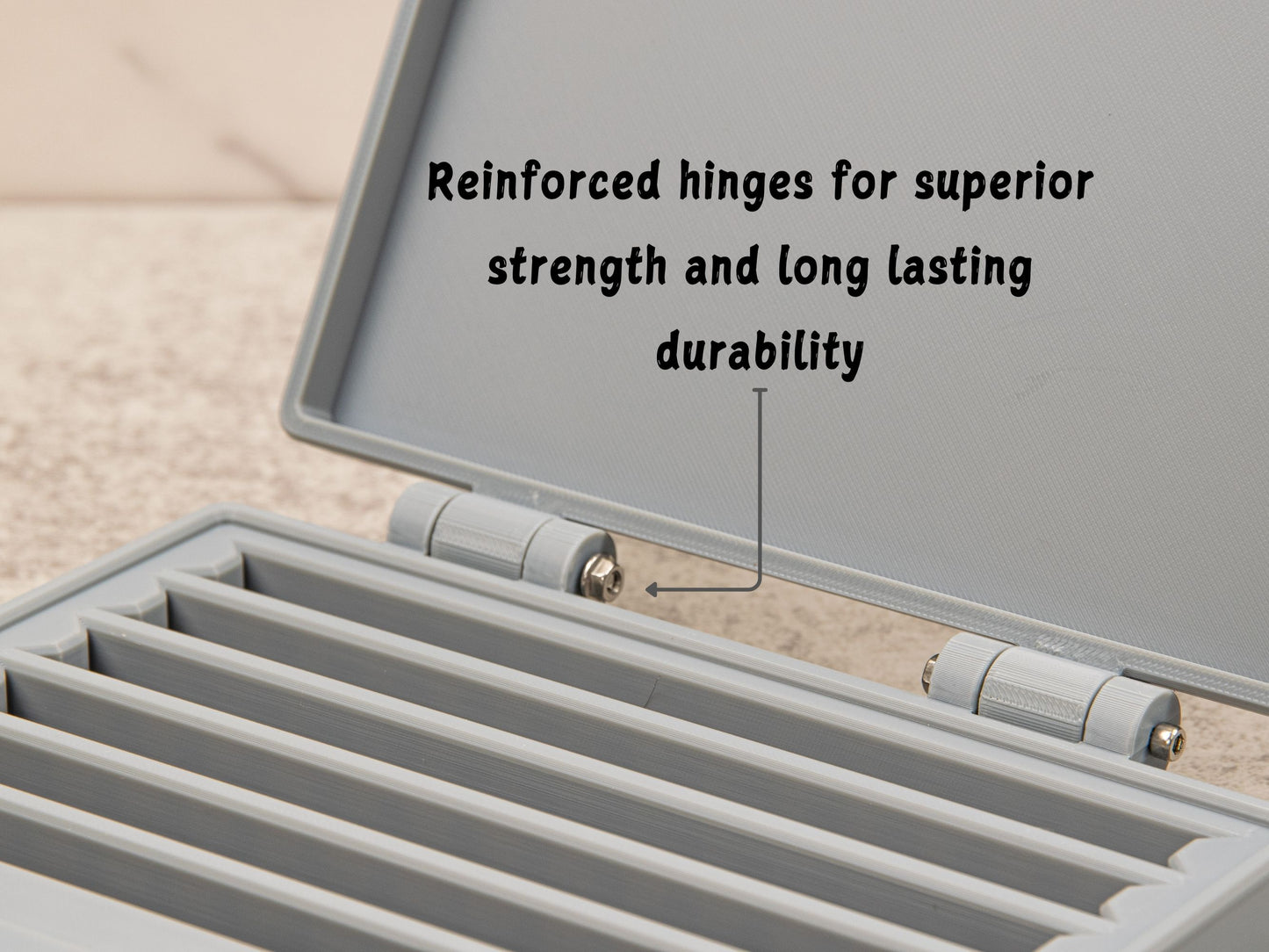 Zoomed-in view of reinforced hinges on sharpening stone case, designed for strength and long-term durability.
