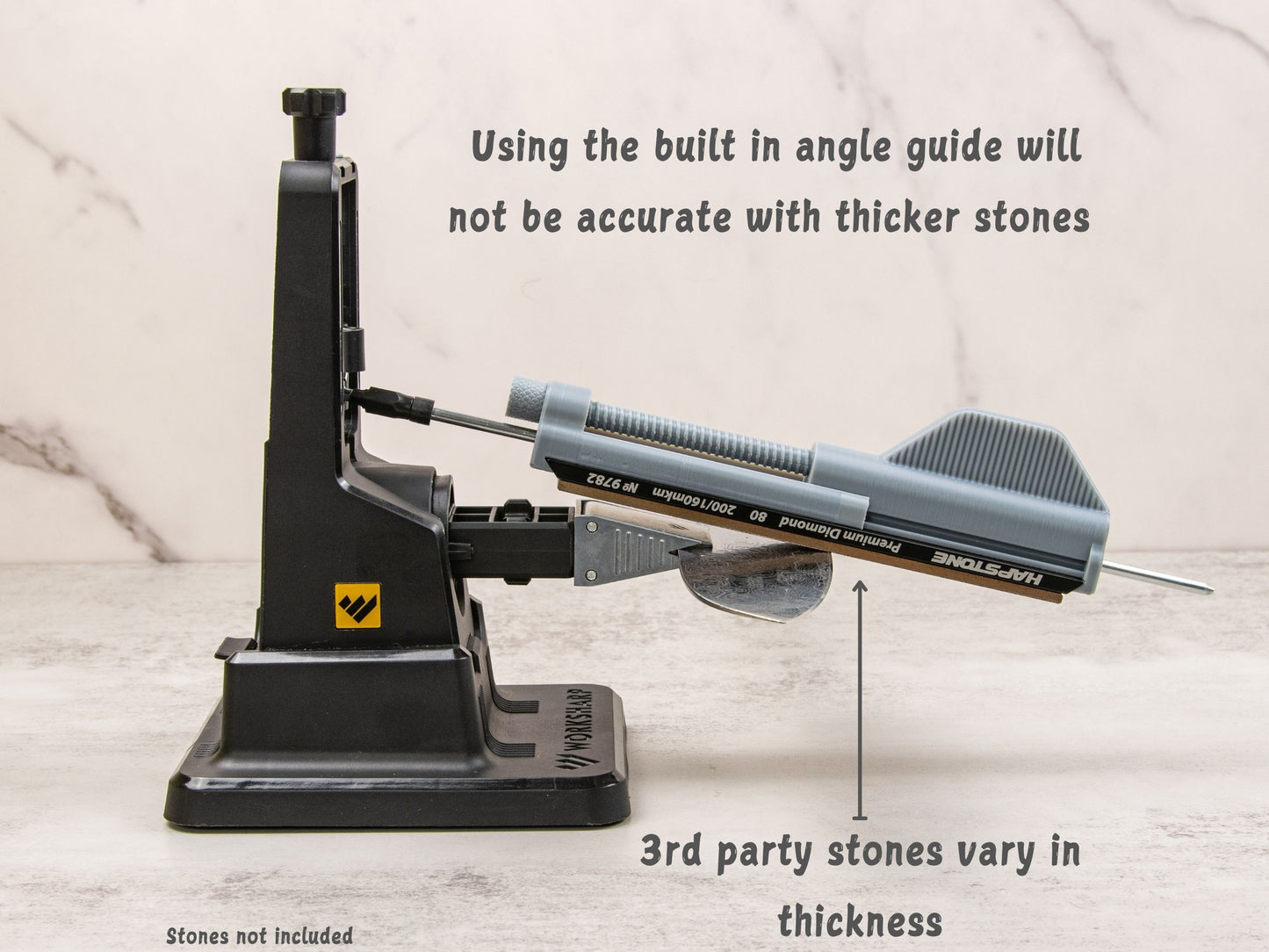 Stone holder on Work Sharp sharpener showing angle variance with thicker stones