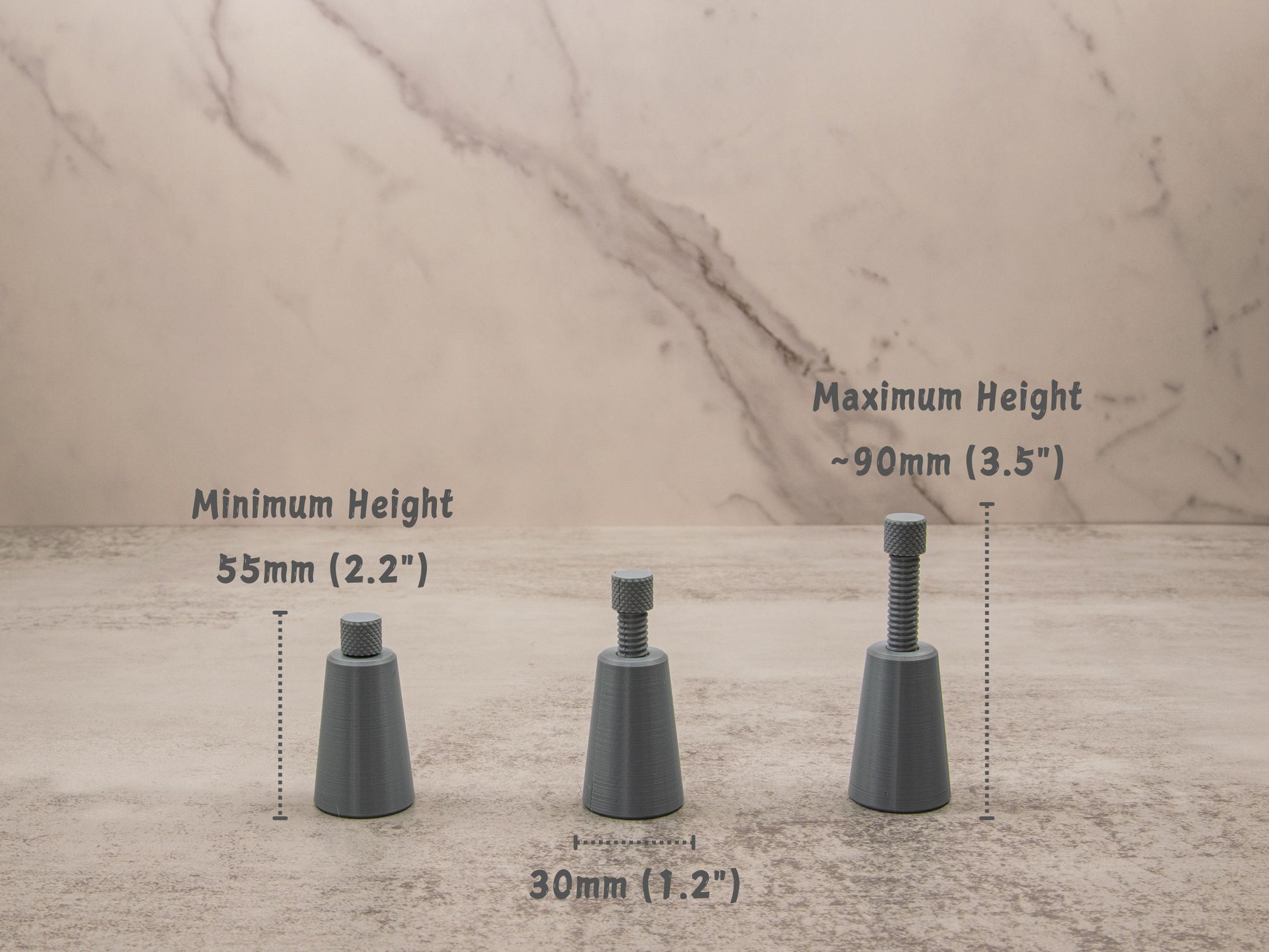 Three adjustable knife edge supports in varying heights (55mm to 90mm) with a 30mm wide base, shown on a marble background.