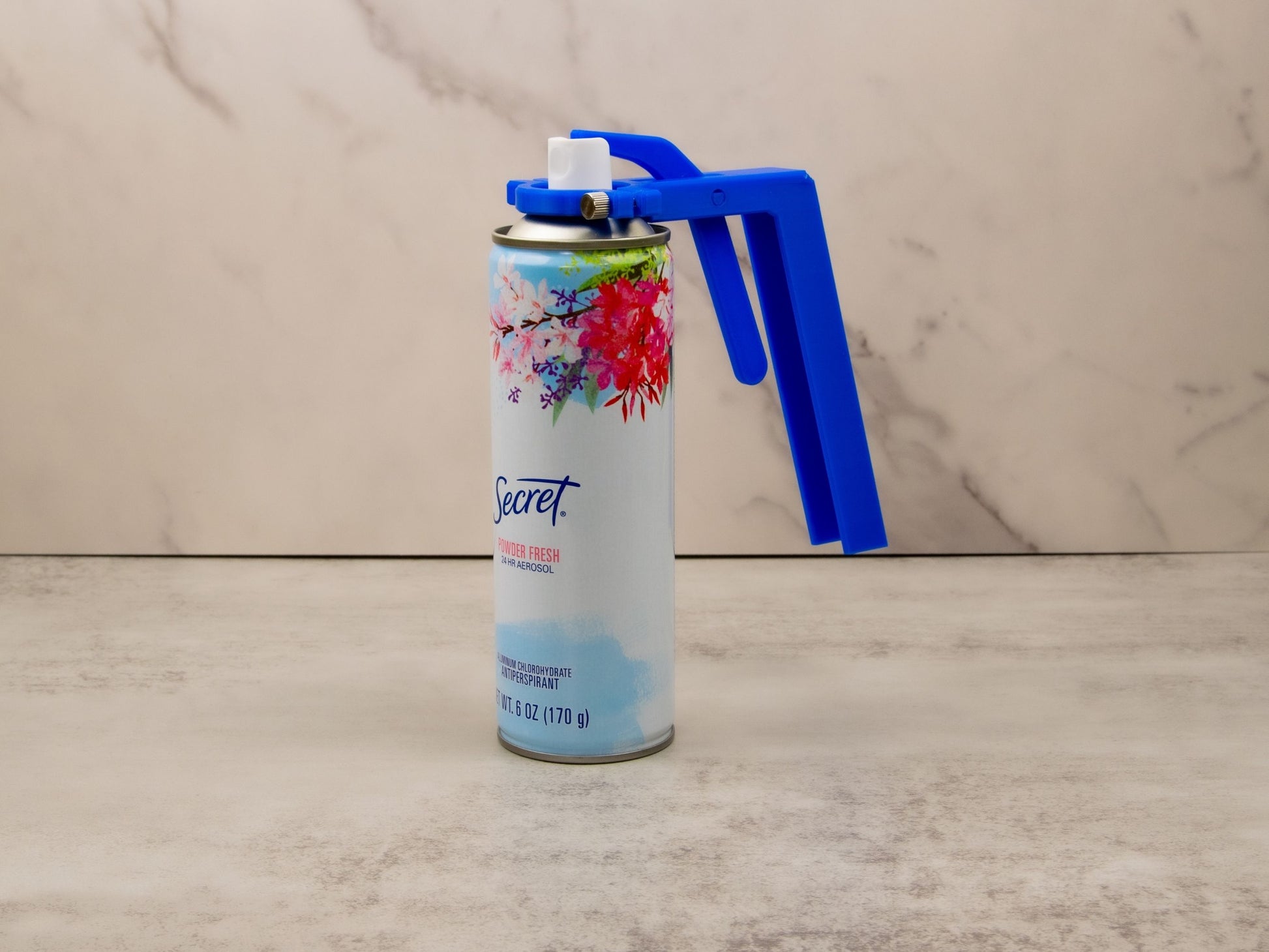 Clean product view of aerosol spray assistant mounted on a can – simple, functional accessibility tool