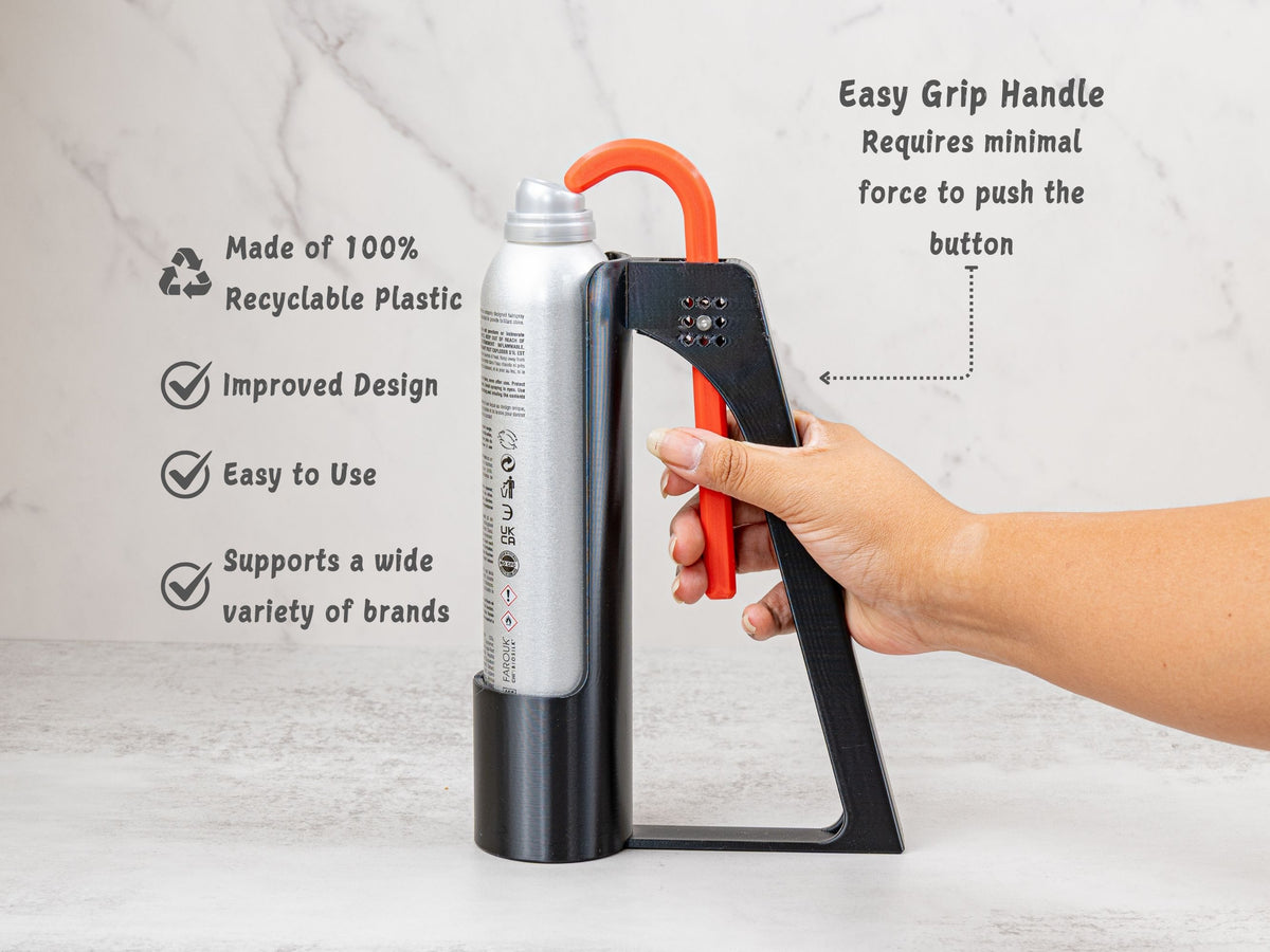 Hand squeezing the easy grip handle of the Hairspray Assistant with a tall hairspray can installed.