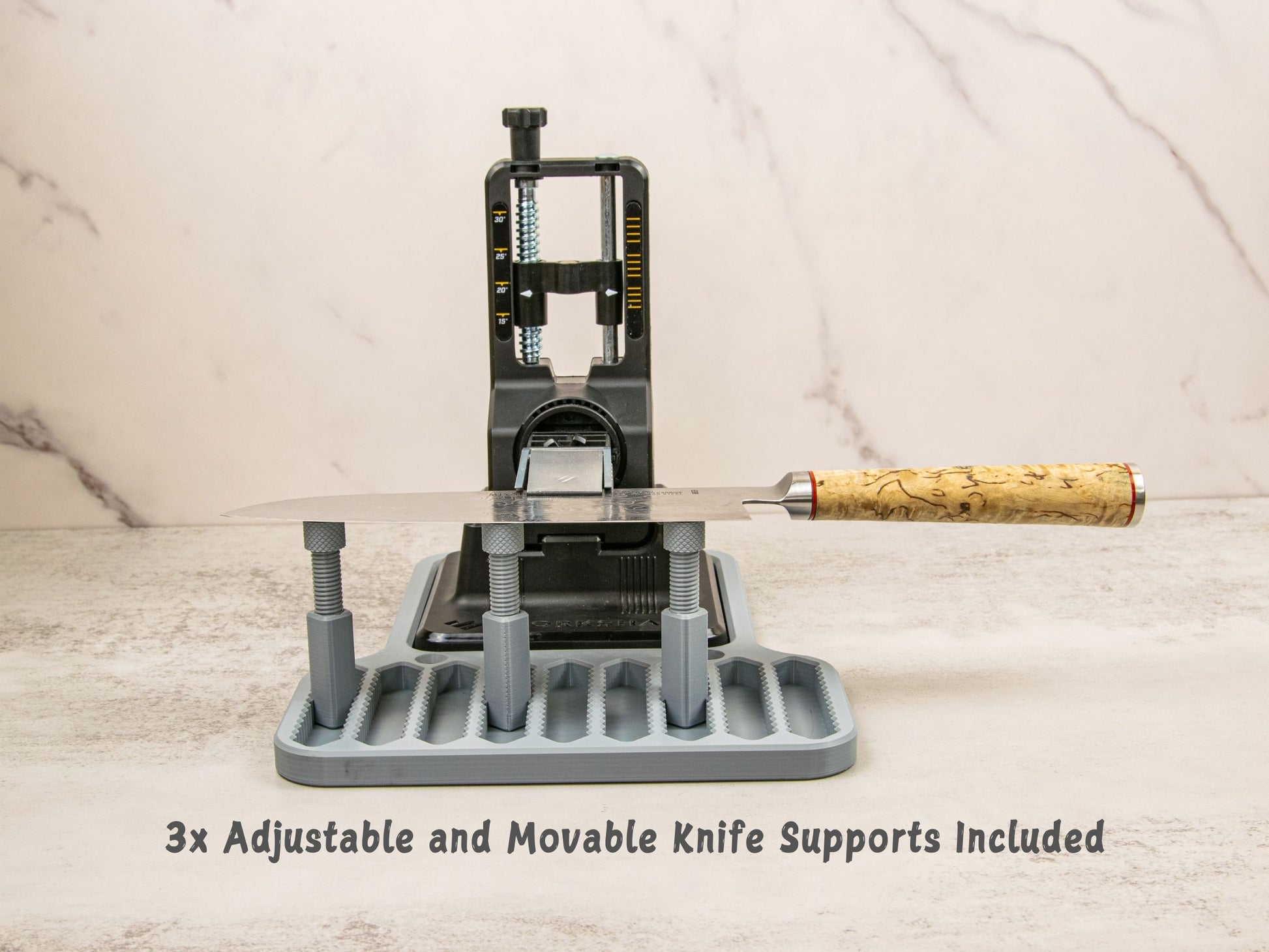 Three adjustable knife supports shown on platform for Work Sharp Precision Adjust knife sharpener.