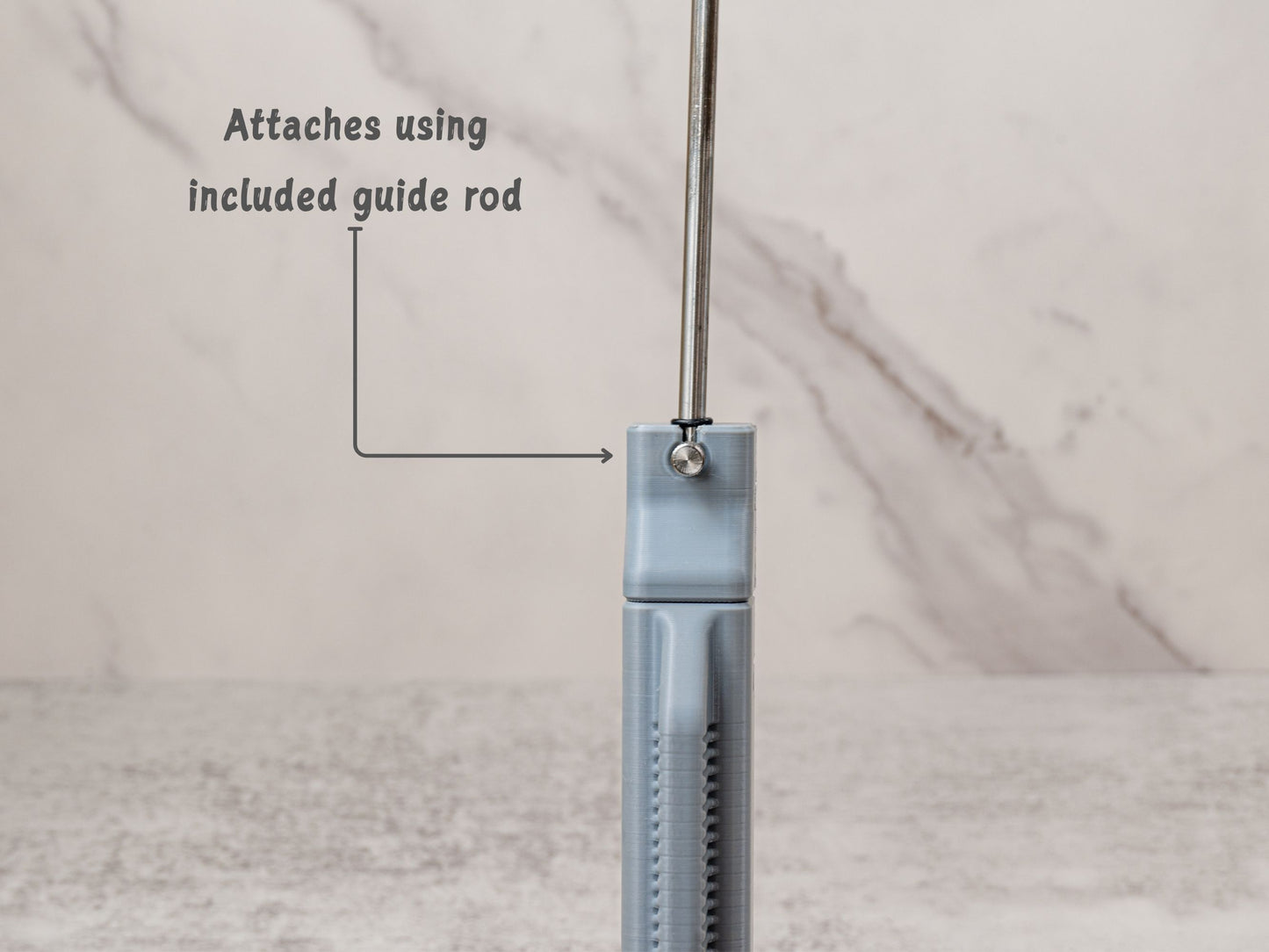 Universal Stone Holder attaches directly to the included Sharpal 202H guide rod, allowing the holder to work with the existing sharpening system without replacing the rod.
