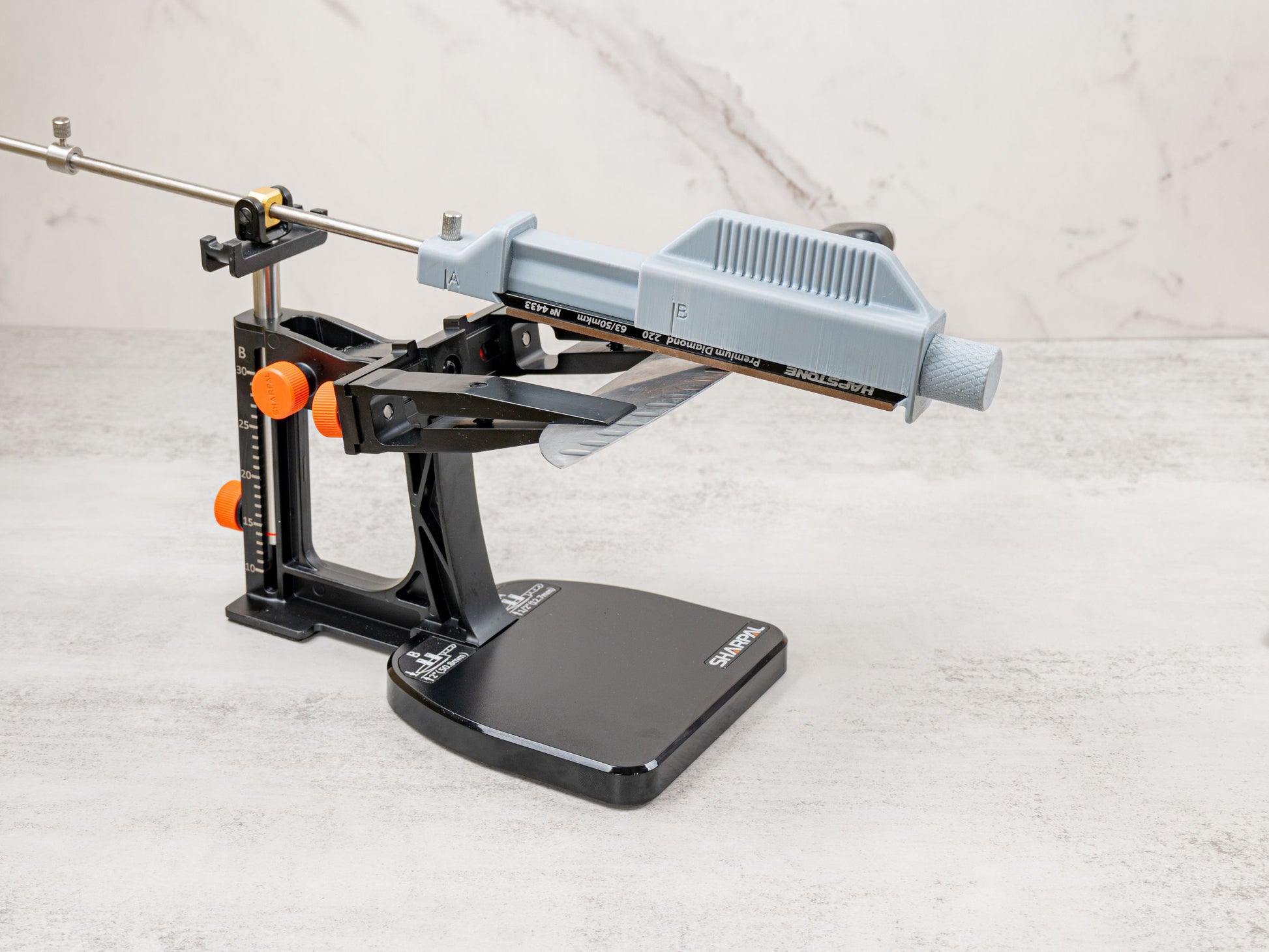 Universal Stone Holder installed on the Sharpal 202H fixed angle knife sharpener. Designed to let you use many third party 4 inch to 6.25 inch sharpening stones.