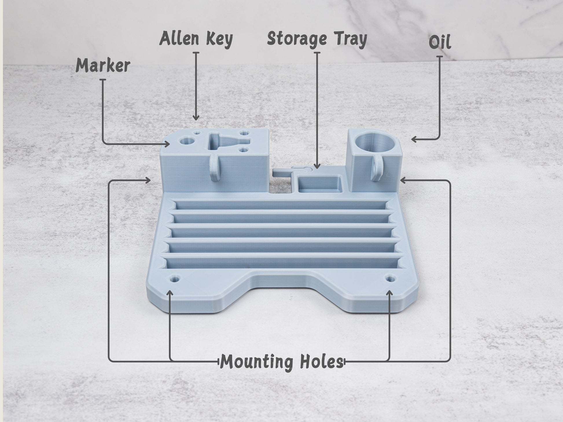 Top down view of the organizer tray for the Xarilk Gen 3 Knife Sharpener labeled to show marker holder, Allen key slot, storage tray for small parts, oil holder, and mounting holes.