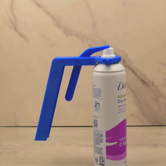 Video demonstrating how to use the Aerosol Can Spray Assistant to easily press down on aerosol can buttons for individuals with limited grip strength or mobility issues.