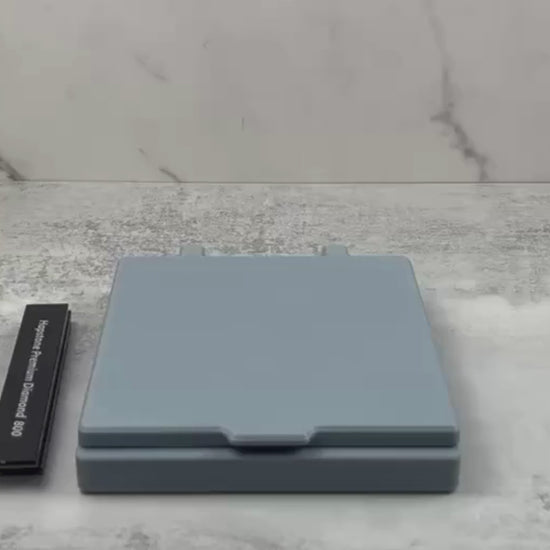 Demonstration of the sharpening stone storage case with lid, showing how 6"x1" stones fit securely inside and how the magnetic lid and reinforced hinges operate.