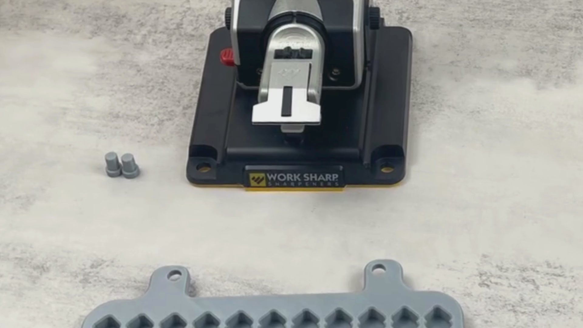 Video demonstration of Work Sharp platform with adjustable knife supports used for stabilizing long blades during sharpening
