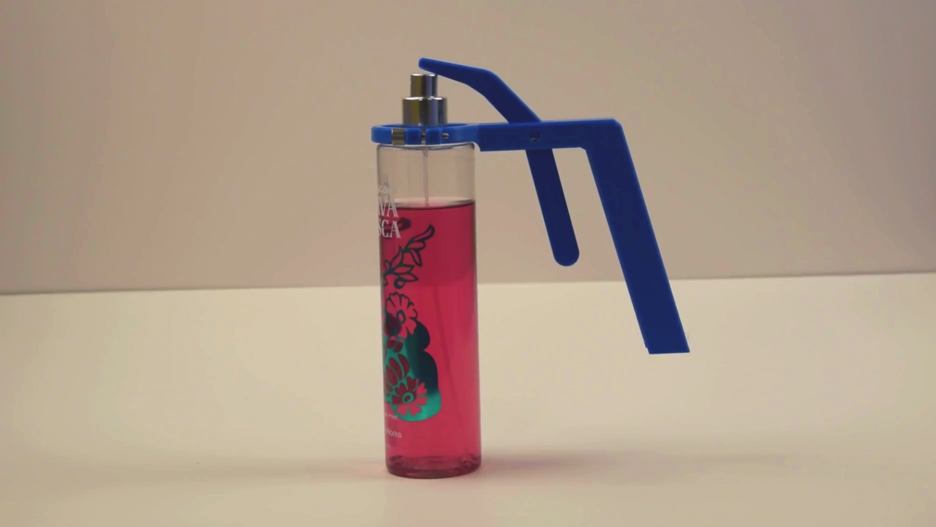 Video showing the Bath & Body Works Body Spray Assistant in action, helping users effortlessly spray fragrance from large and small bottles.