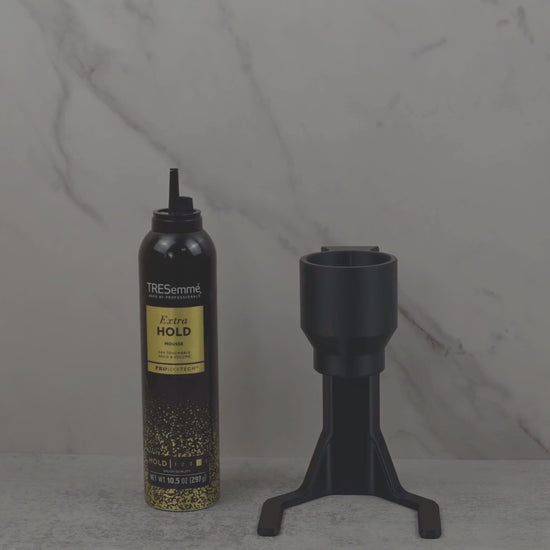 Demonstration of hair mousse dispenser for arthritis and limited mobility